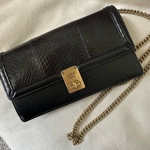Coach black snakeskin clutch